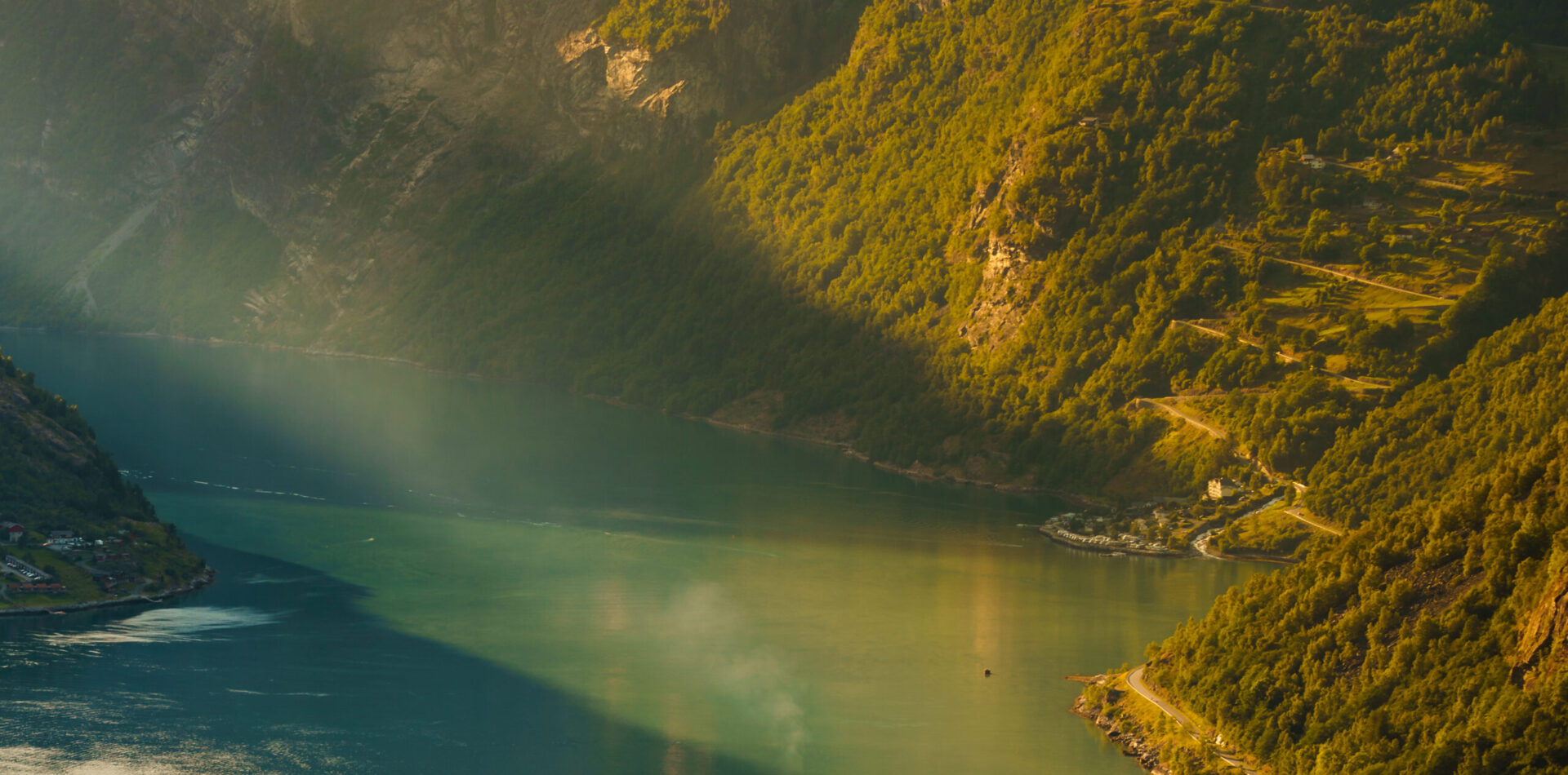 Cruise ship on fjord, Geiranger Norway.